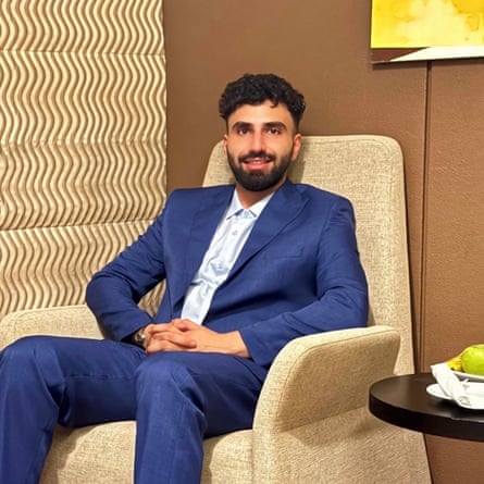 A man sitting in an armchair