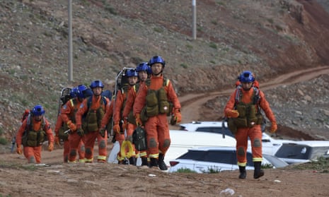 Rescuers at site where runners died in north-west China