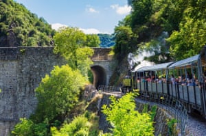 A steam locomotive takes passengers into the gorges of the Ardèche.