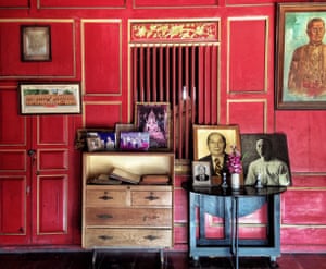 REd walls, and family portraits, Sol Heng Tai Mansion