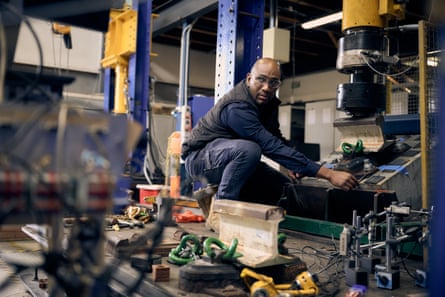 Man working on a hydraulic press