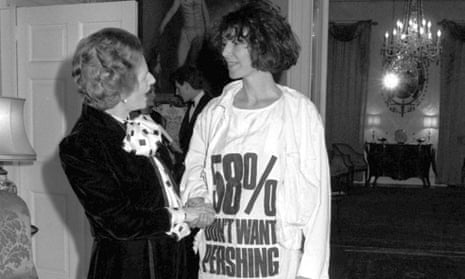 Margaret Thatcher greets Katharine Hamnett, wearing a T-shirt with a nuclear missile protest message, at 10 Downing Street, where she hosted a reception for London Fashion Week designers in 1984.