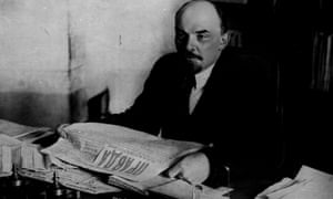 Lenin reading a copy of Pravda in 1920.