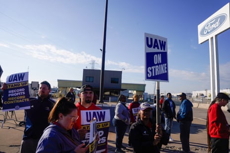 Members of the United Auto Workers union (UAW) gather in front of the Ford Michigan Assembly Plant during the first day of a strike called in response to failed contract negotiations with the Big Three automakers - General Motors, Ford, and Stellantis, the parent company of Jeep and Chrysler - in Detroit, Michigan, USA, 15 September 2023.