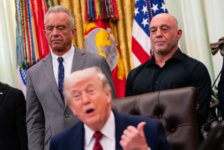 Robert F Kennedy Jr, Donald Trump and Joe Rogan astatine an executive bid signing regarding psychedelics successful nan White House, 18 April 2026.