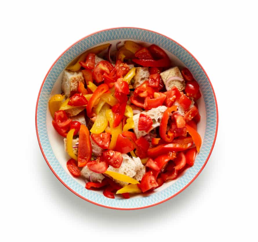 How to make panzanella – recipe | Food 7 Add the tomatoes to the bowl.