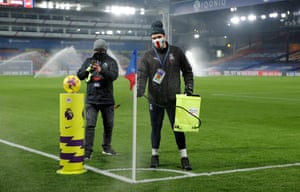 The corner flag is disinfected before kick-off at Crystal Palace v Newcastle on 27 November.