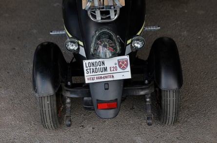 A sign on a disabled person’s motorised wheelchair