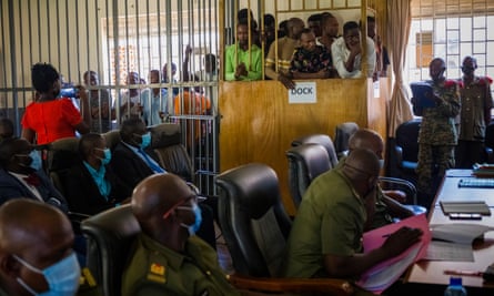Ali Bukeni, Daniel Brenny Oyerwot, Eddy Ssebuufu and others at a bail hearing.