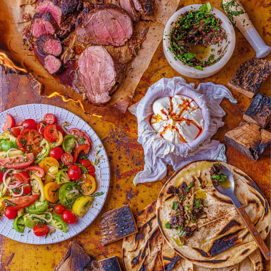 Grilled lamb leg, atom yoghurt, dressed tomatoes, and black olive and anchovy flatbreads.