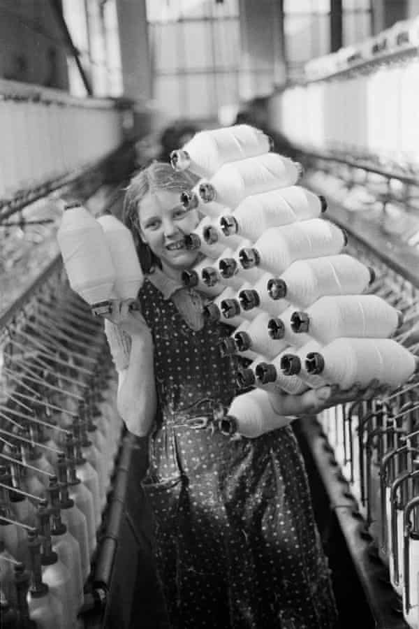 A young worker at Eckersley’s cotton mill in Wigan, Greater Manchester, UK, 1939.
