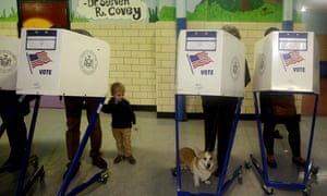 Voters in booths