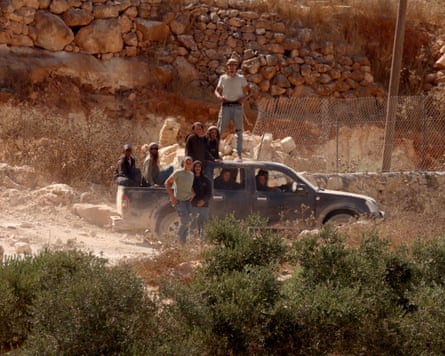 People on a flatbed truck