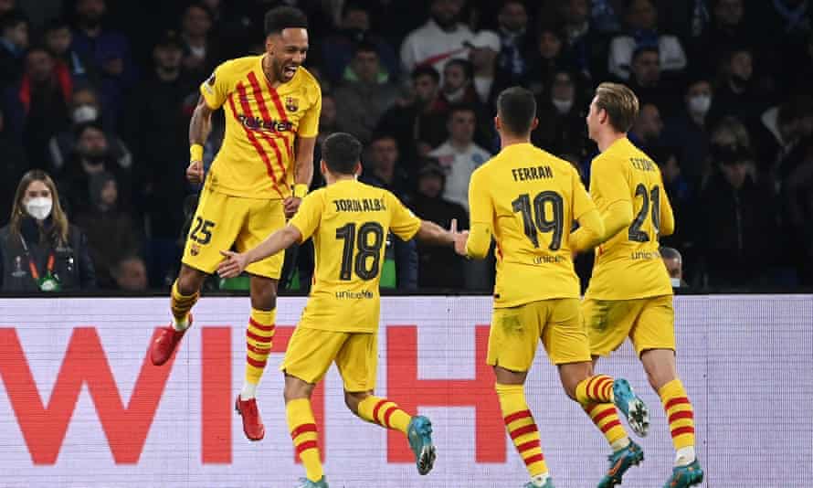 Pierre-Emerick Aubameyang (L) celebrates with teammates after scoring his fourth fourth goal.