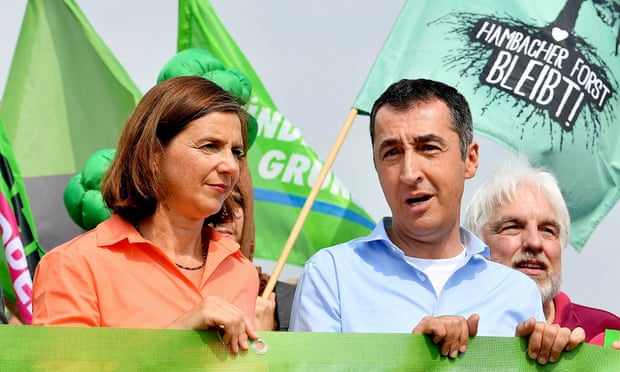 Katrin Göring-Eckardt and Cem Özdemir, joint leaders of the German Green party, at a coal mining protest in Manheim.
