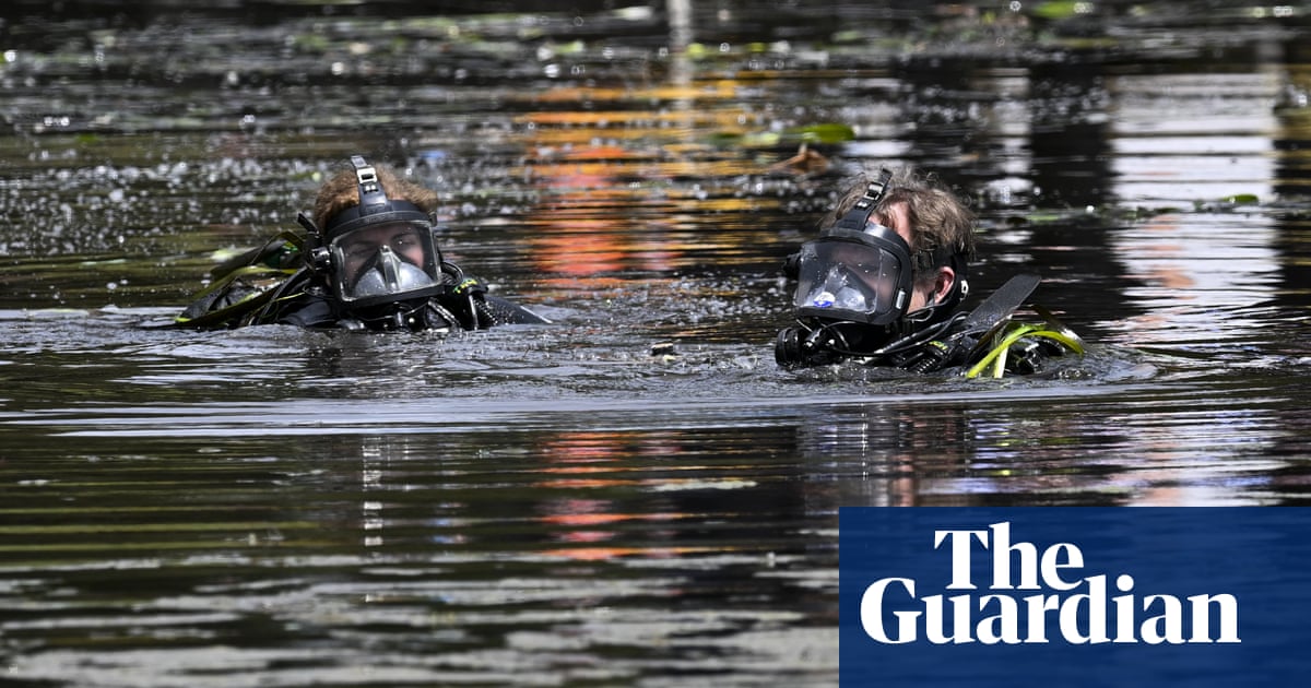 Deaths of mother and two sons found in Canberra pond being treated as murder-suicide, police say