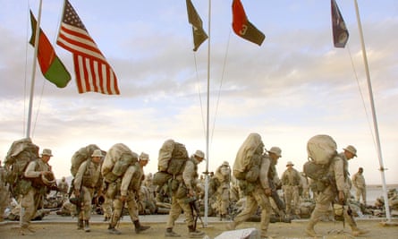 US Marines from India company march as they prepare to depart the American military compound at Kandahar airport, Afghanistan.