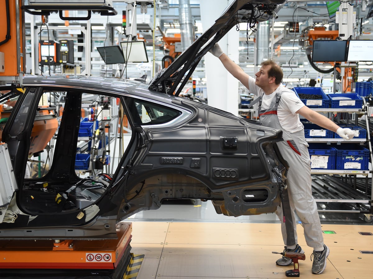 Audi plans 9,500 job cuts to save £5bn for electric car investment | Automotive industry | The Guardian
