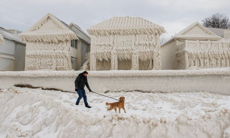 Homes covered in ice in Fort Erie, Canada, following a massive snow storm across North America, 28 December 2022