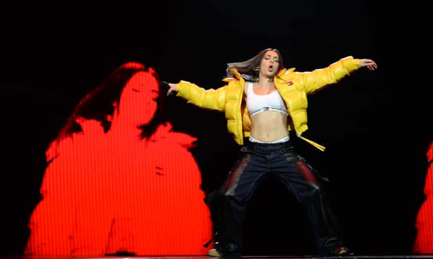 Charli XCX performing in November 2021.