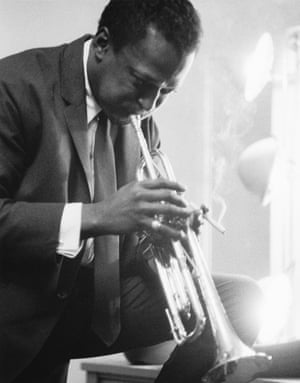 Miles DavisAmerican jazz musician, bandleader and composer Miles Davis playing the trumpet in a dressing room before a performance