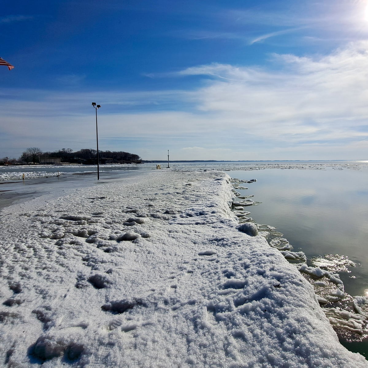 Vanishing ice and snow: record warm winter wreaks havoc across US