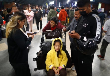 Passengers bound for the Middle East wait at Tribhuvan International Airport