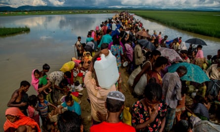 A large group of Rohingya people try to cross the border in Palongkhalii of Cox’s Bazar, Bangladesh.
