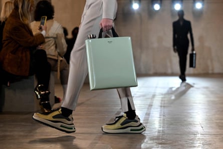 A model presents a creation by Prada during the Autumn-Winter 2023-2024 Men’s fashion show as part of the Milan Fashion Week, in Milan on January 15, 2023.