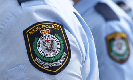 Close-up of NSW police patches on uniforms