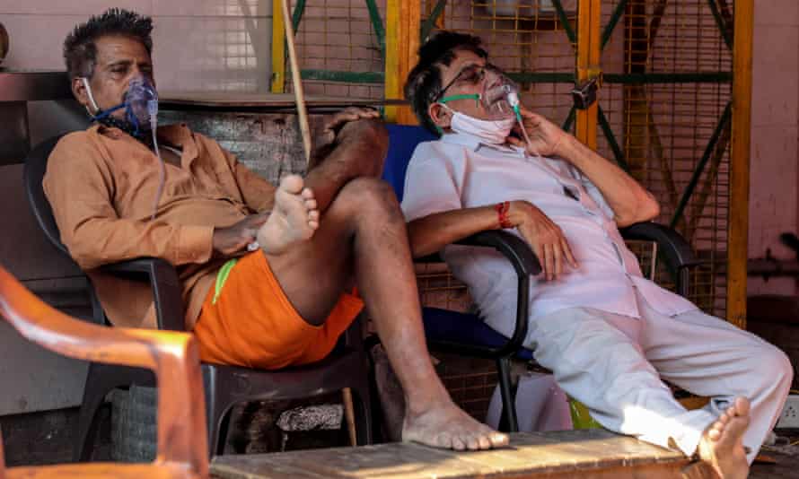 Suspected Covid-19 patients receive oxygen at a Sikh shrine in Delhi, India.