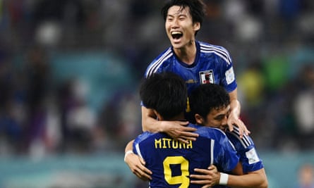 Kaoru Mitoma, Wataru Endo and Yuto Nagatomo celebrate their 2-1 win over Germany.