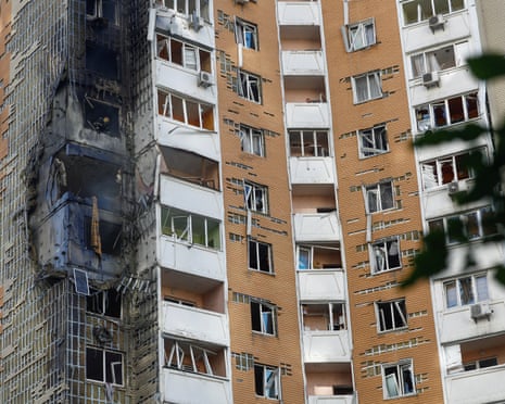 A firefighter inspects an apartment inside a residential building hit by a Russian drone strike, amid Russia's attack on Ukraine, in Kyiv, Ukraine.