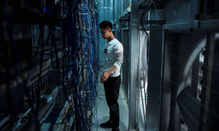 A worker at a cryptocurrency mining rig in dujiangyan, sichuan province