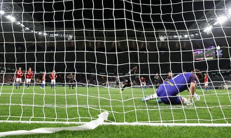 Sydney United 58 goalkeeper Danijel Nizic is beaten by Macarthur’s Al Hassan Toure in the Australia Cup final penalty shootout.