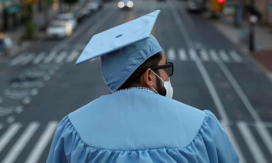 Graduates gather at Columbia University during coronavirus disease (COVID-19) outbreak in Manhattan, New York City<br>A graduating Masters student from the Columbia University Graduate School of Architecture, Planning and Preservation (GSAPP) stands on campus the day before his graduation ceremony, which is to be held online due to the outbreak of the coronavirus disease (COVID-19) in Manhattan, New York City, U.S., May 15, 2020. REUTERS/Andrew Kelly