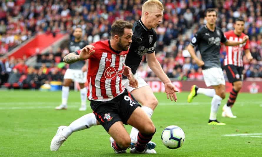 Danny Ings goes down under the challenge of Ben Mee in the box but a penalty was not awarded.