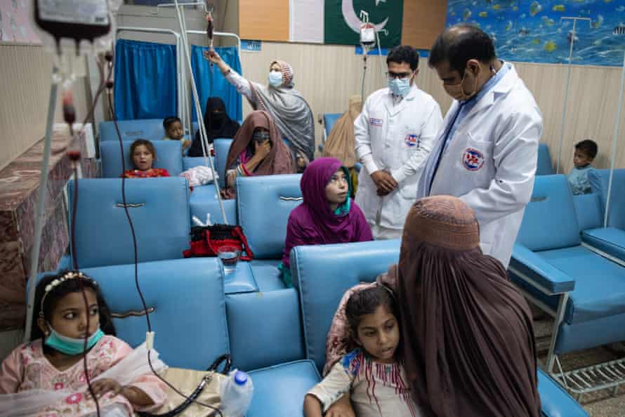 Doctors treat patients at the Hamza Foundation on September 29 in Peshawar, Pakistan.