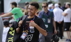 Jubb flashes a winning smile as he arrives for a training session at Wimbledon in June 2019.