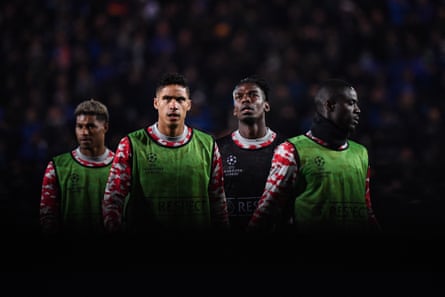 Marcus Rashford, Raphael Varane, Paul Pogba and Eric Bailly warm up before a Champions League match in November 2021
