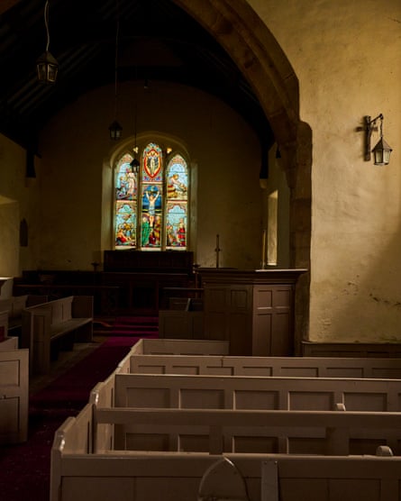 Inside St Tyfrydog’s. Picture shows the pews and stained glass window behind the altar