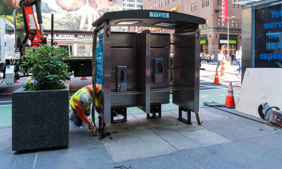 The last public pay phones in Manhattan, on the corner of 7th Avenue and 50th Street, being removed, New York City, 23 May 2022.
