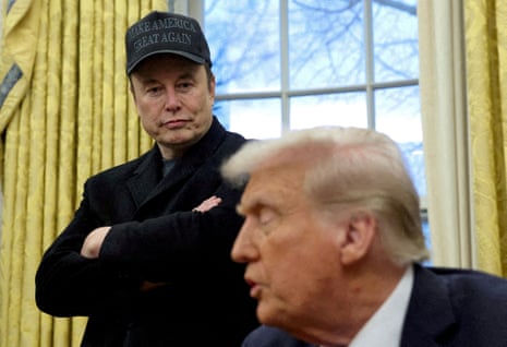 Elon Musk and Donald Trump are shown in the Oval Office in Washington.