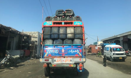 One of the Zamyad pickup trucks loaded with empty barrels.