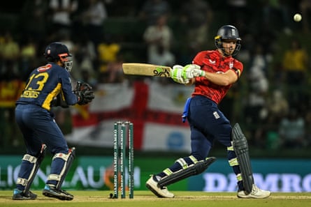 England’s Jos Buttler sweeps against Sri Lanka in the third T20i