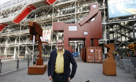 Dutch artist Joep van Lieshout poses in front of his artwork named Domestikator in front of the Centre Pompidou modern art museum