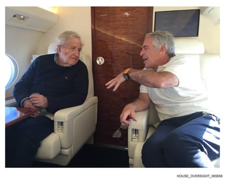 two men speak in a plane