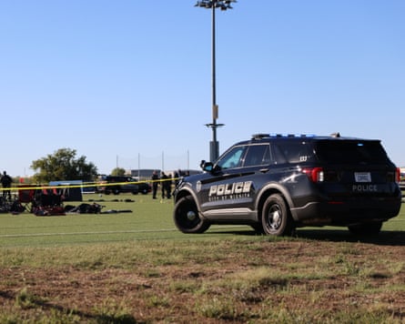 A police vehicle on a sports field