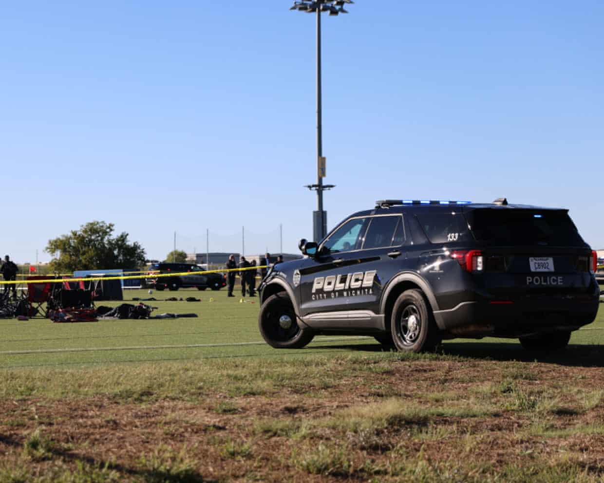 A police vehicle on a sports field