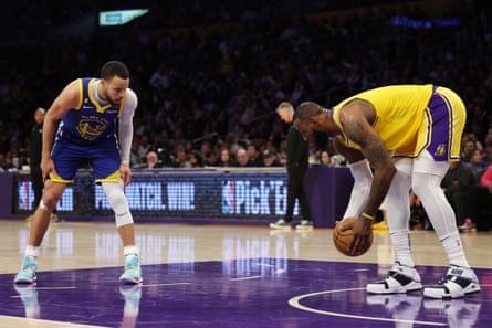 LeBron James of the Lakers picks up the ball in front of Stephen Curry of the Warriors during the third quarter of Friday night’s Game 6 of their Western Conference semi-final tie.